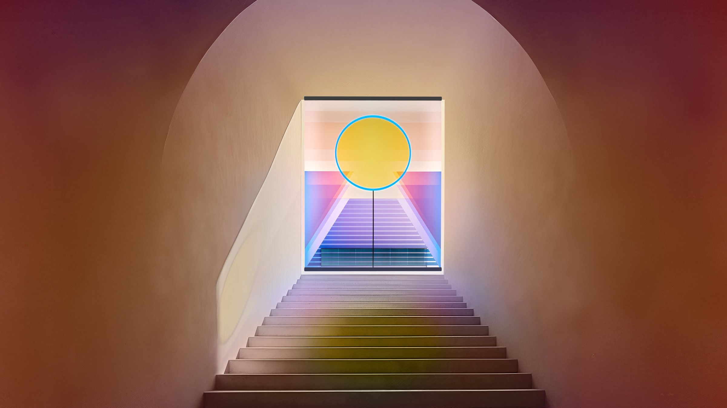 RA installed at the top of a curved stairway, casting coloured light through the space