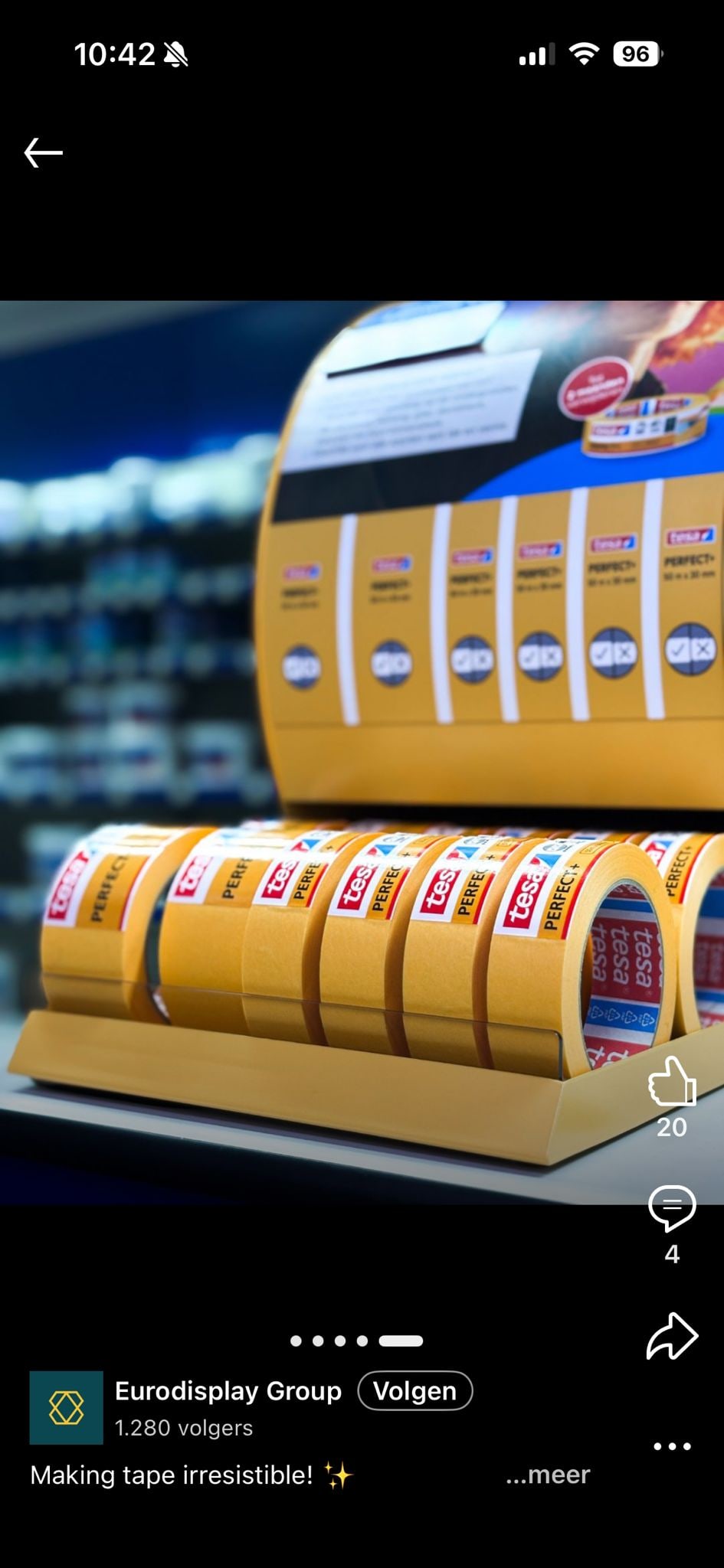 Row of Tesa Perfect tape rolls arranged in the finished dispenser