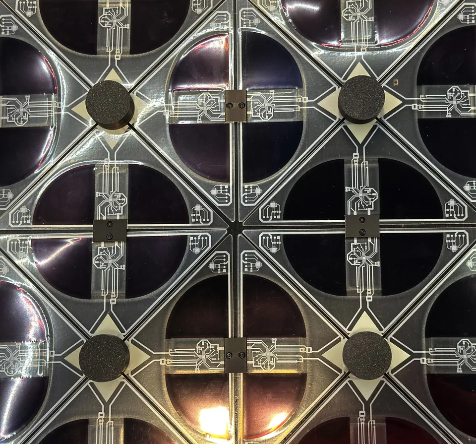 Close view of the modular Between Lights surface with repeating solar cells, printed circuits and connection points