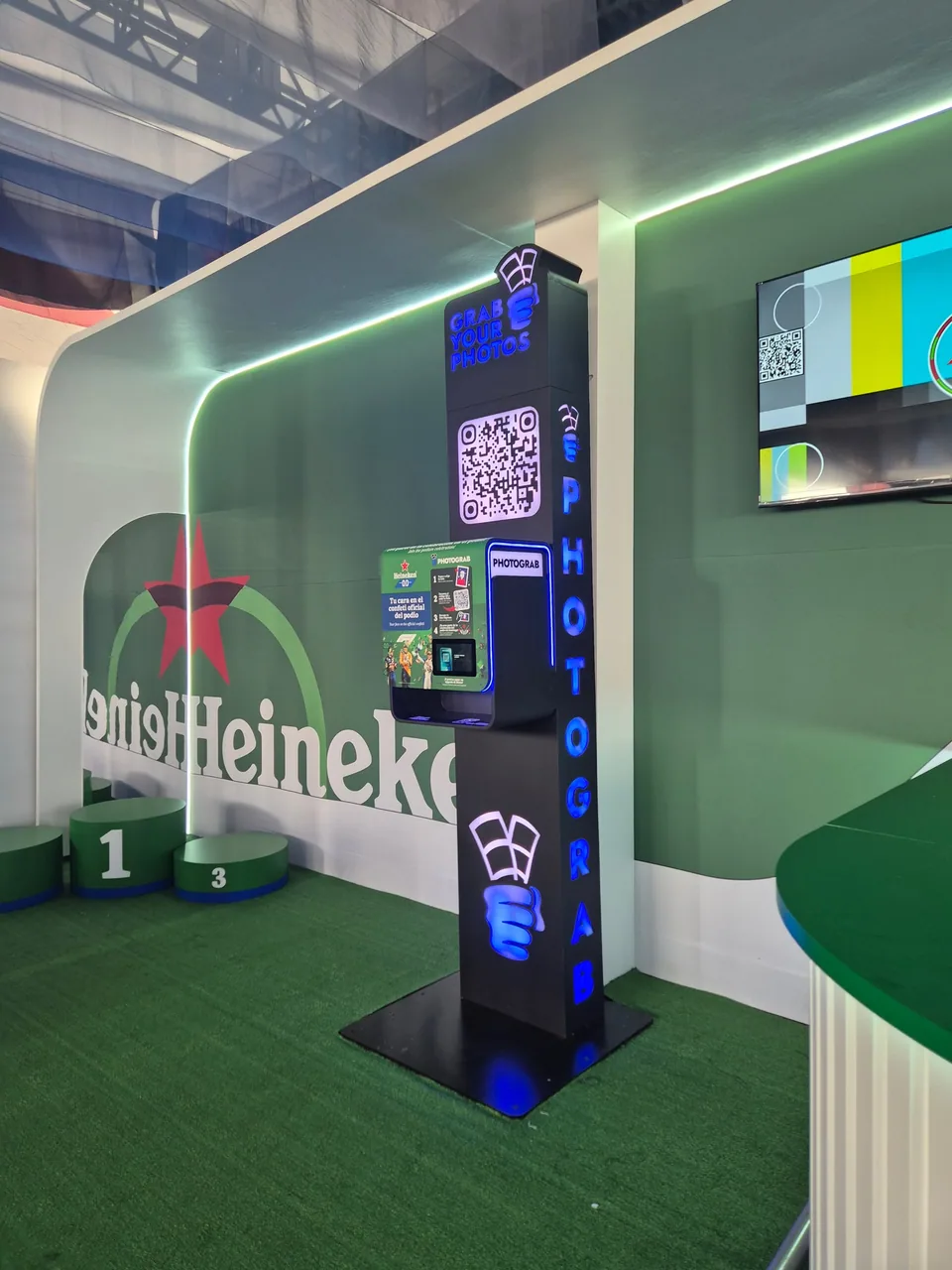 PHOTOGRAB capture and print station inside a branded event environment