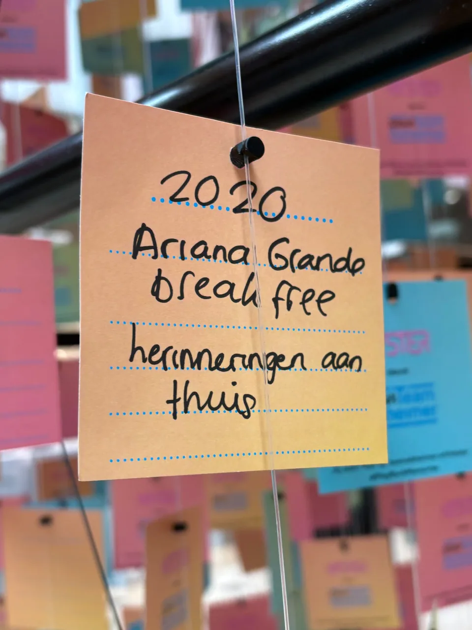 A handwritten Hitster card connecting Ariana Grande's Break Free with memories of home