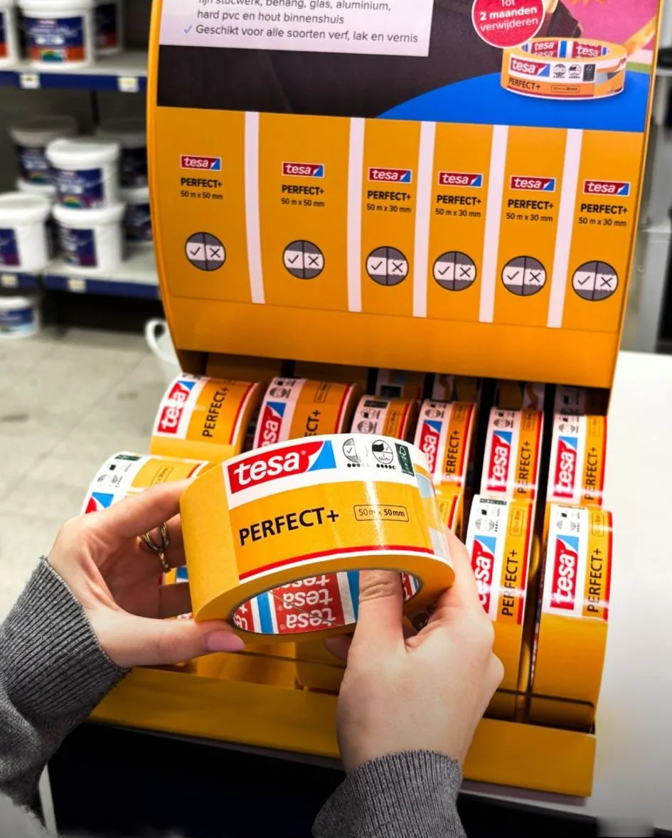 Close view of the branded tape rolls and dispensing shelf